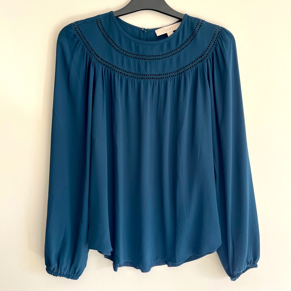 Elegant Blue Blouse by [Brand]